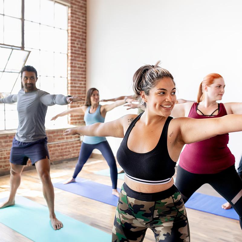 New World Wellness Women Exercising