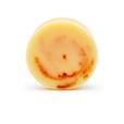 A yellow and orange swirl Dirty dangles tiki deke limited edition tropical stick wax without packaging on a white background.