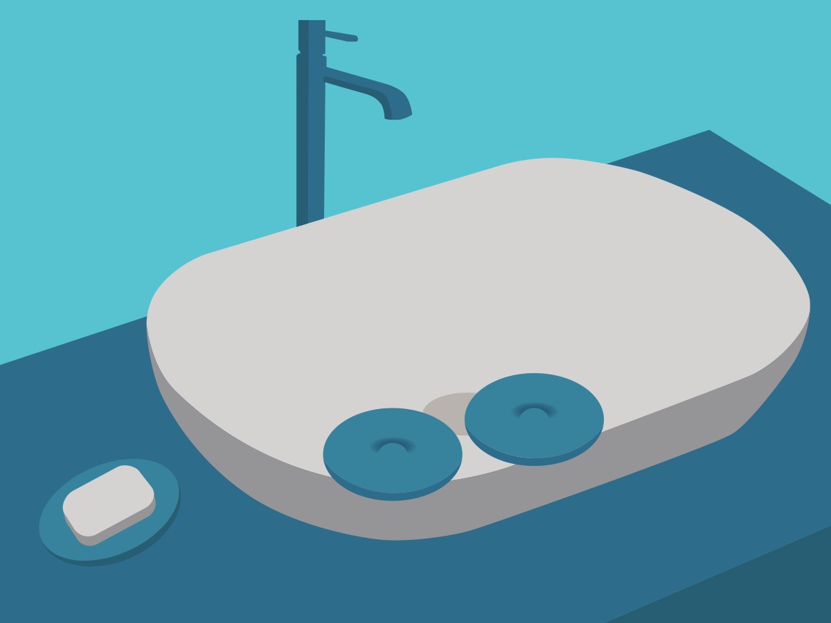 A sink containing two round cooling eye cups with a bar of soap beside it.