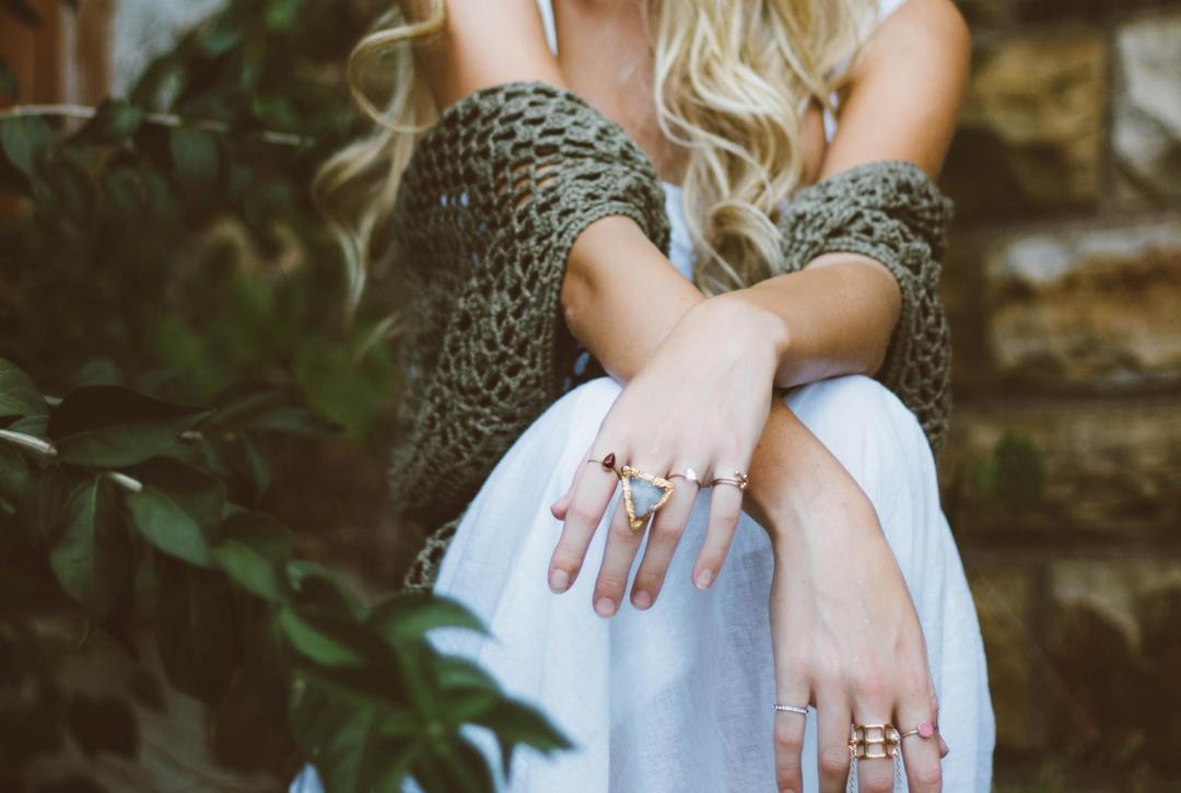 Woman wearing multiple rings
