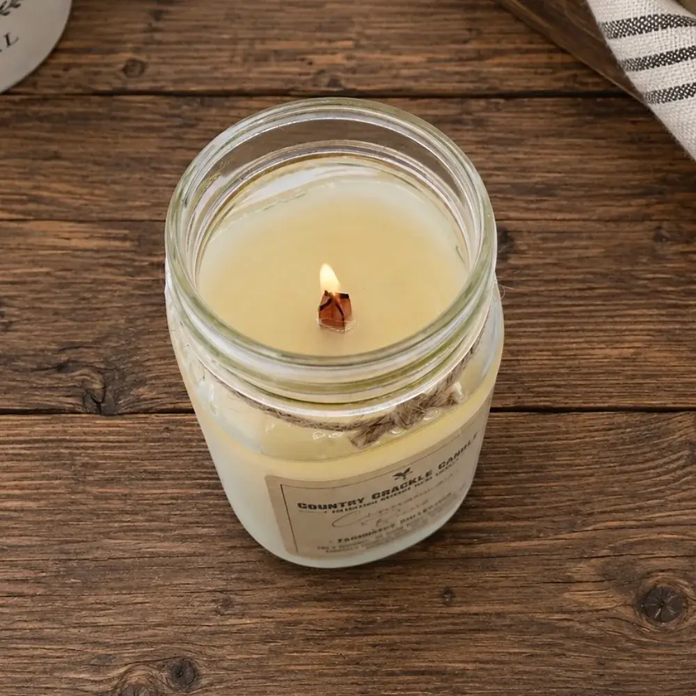 wax fully melted across top of wooden wick soy candle