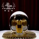 Ierofante Bottle with space helmet and dark red pleated curtain with Art and Olfaction Award Winner Badge