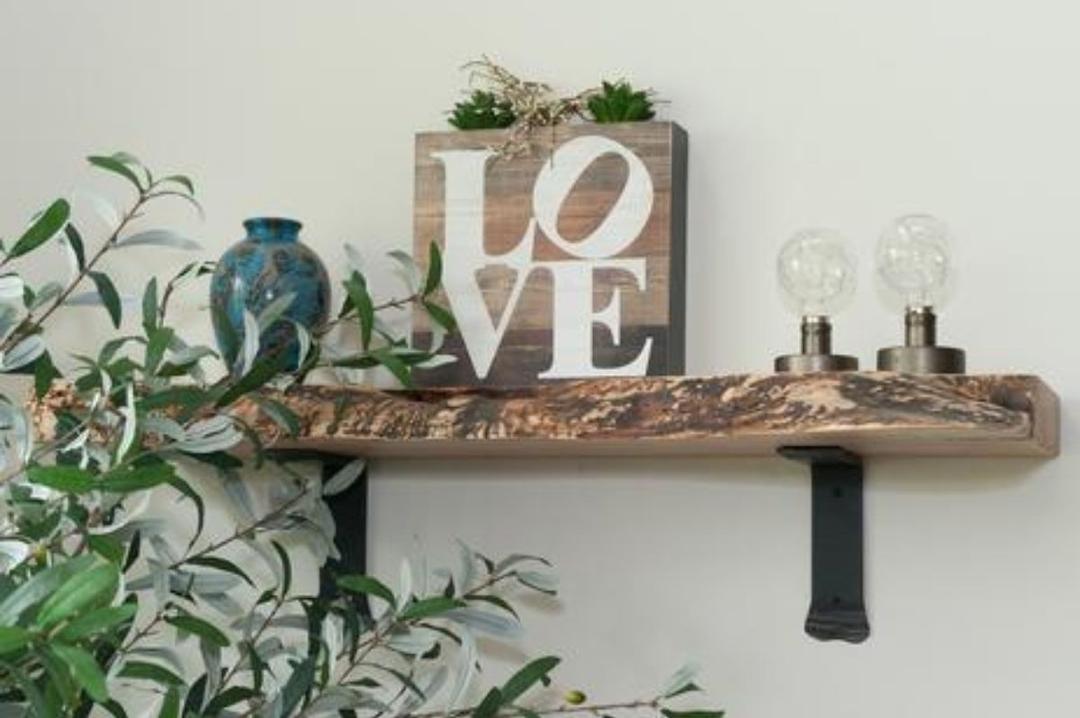 Live edge solid wood shelf with brackets