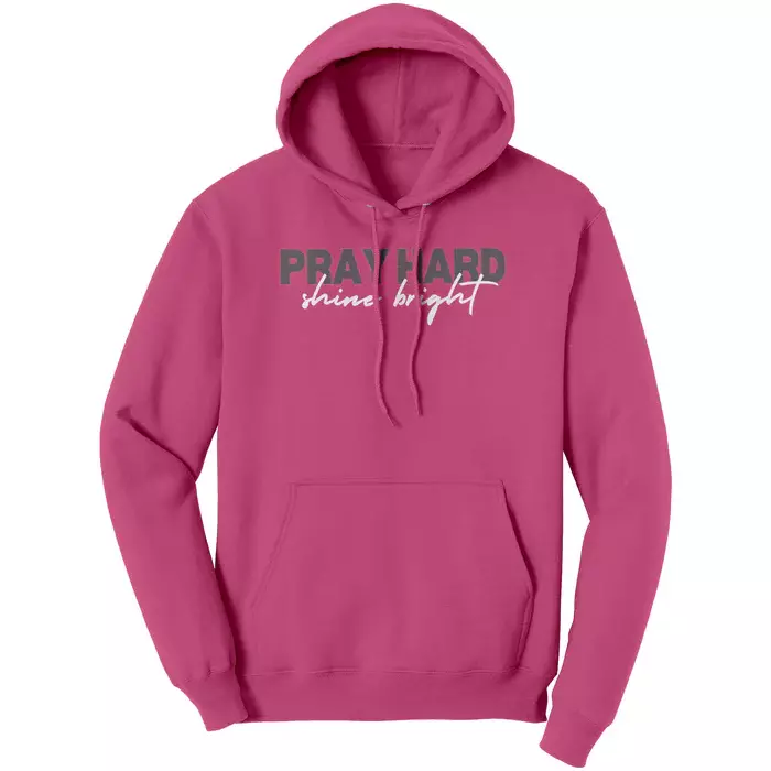 bright pink hoodie that says "Pray hard shine bright"