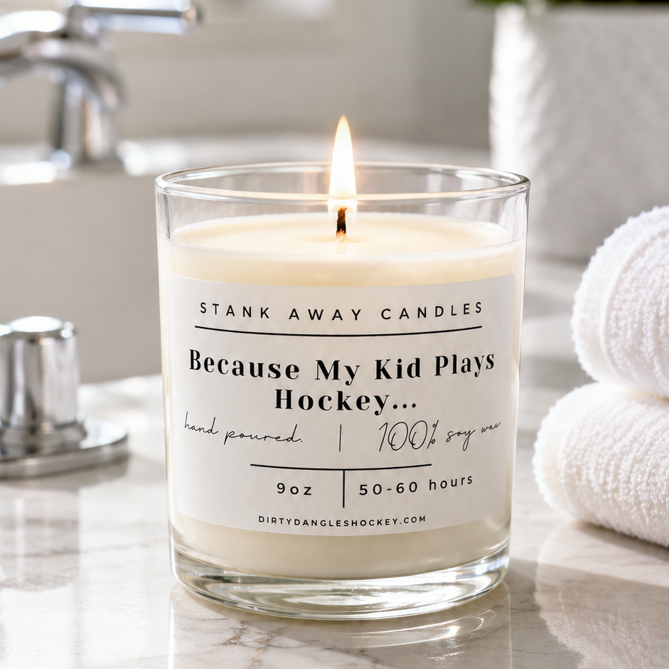 because my kid plays hockey white scented hockey candle in a bathroom setting