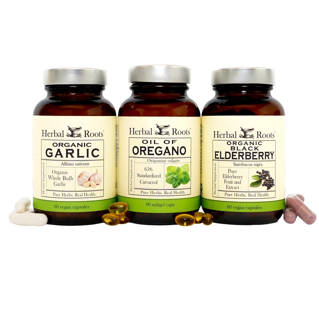 Bottles of Herbal Roots Oil of Oregano, Black Elderberry and Organic Garlic