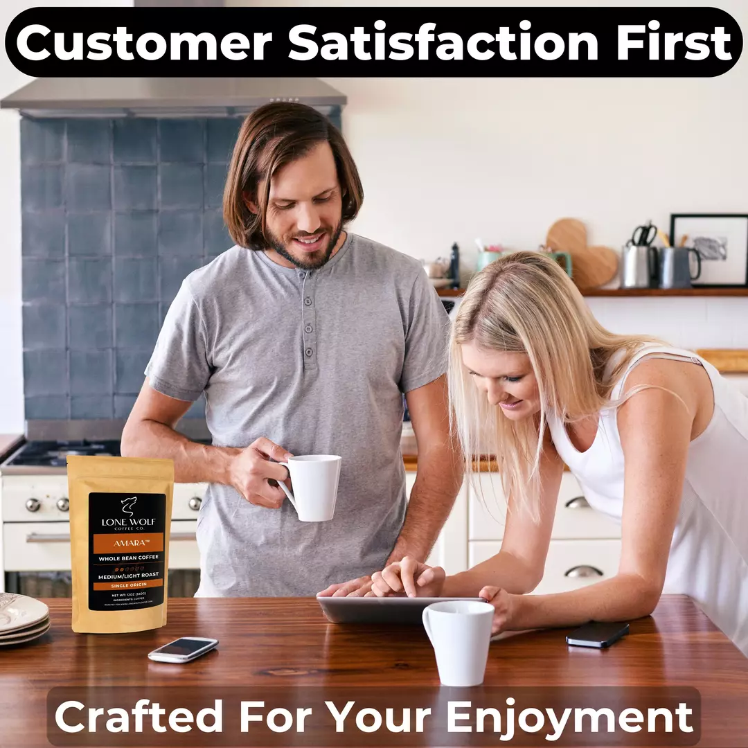 Couple enjoying coffee together in their kitchen with a bag of Lone Wolf Coffee’s Amara Whole Bean, a medium-light roast.