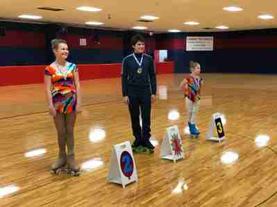 Skaters standing with metals