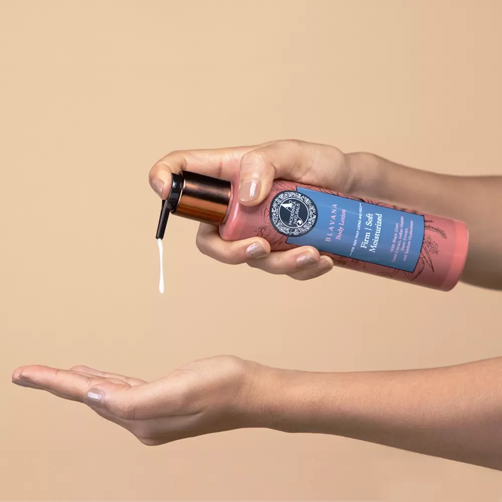 Woman holding Blavana lotion