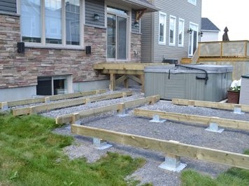 using deck foot anchors to build a deck