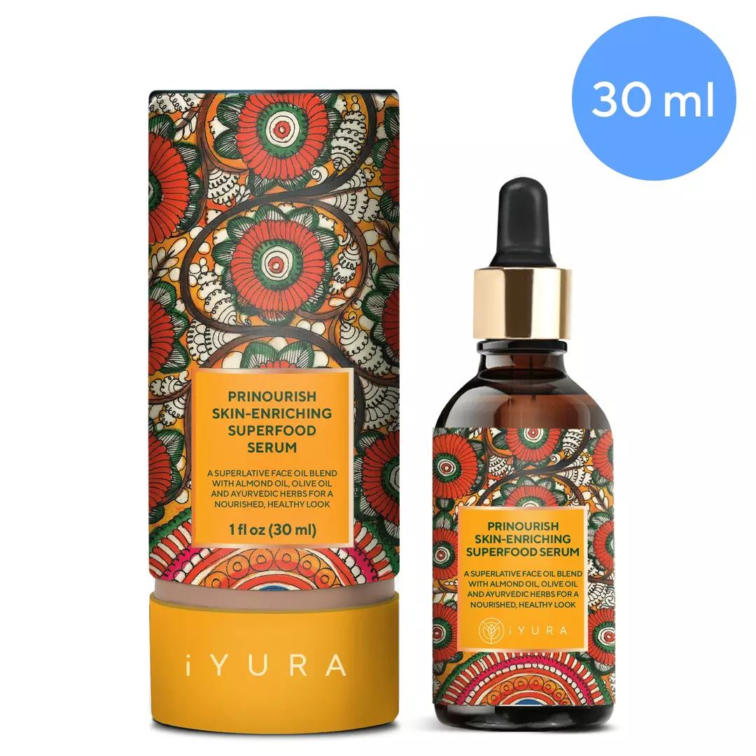 A bottle of Prinourish kept beside it's beautiful, vibrant packaging, in front of a white color background