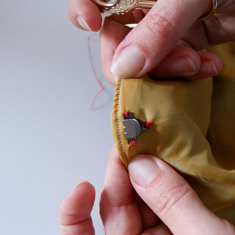 picture showing hook sewn onto a zipper free waistband