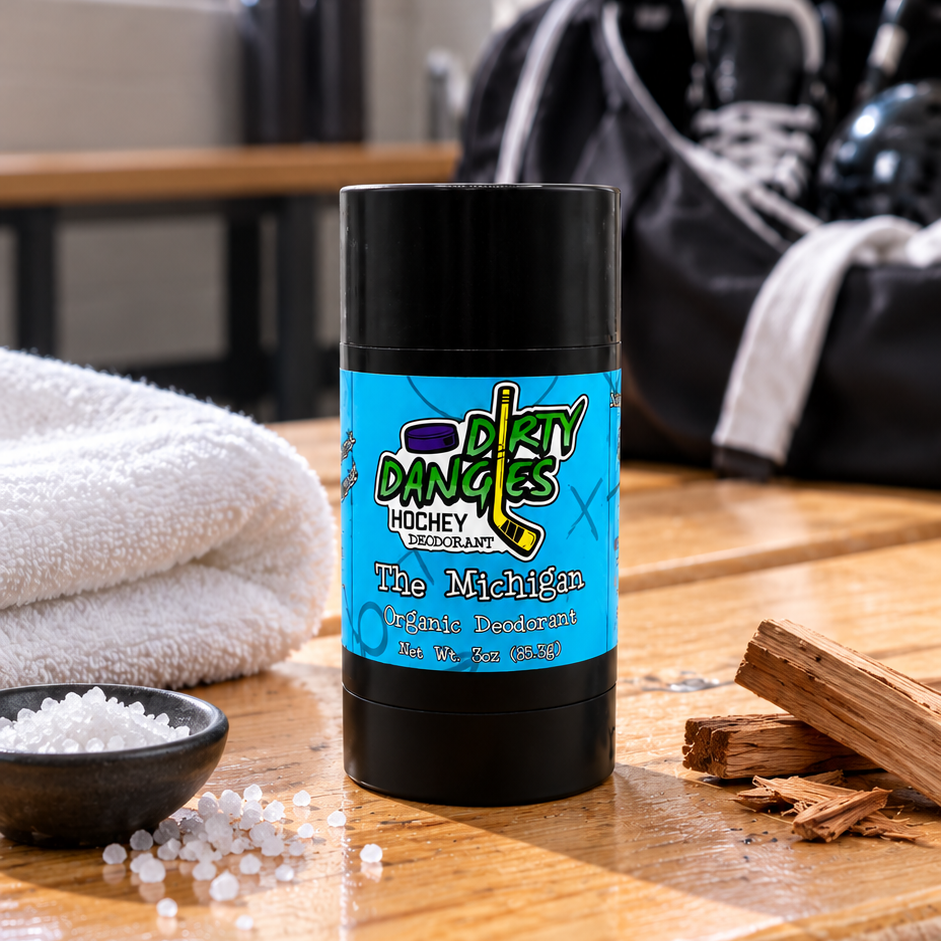 aluminum-free deodorant the michigan scent on a wooden bench in a hockey locker room with sea salt and sandalwood