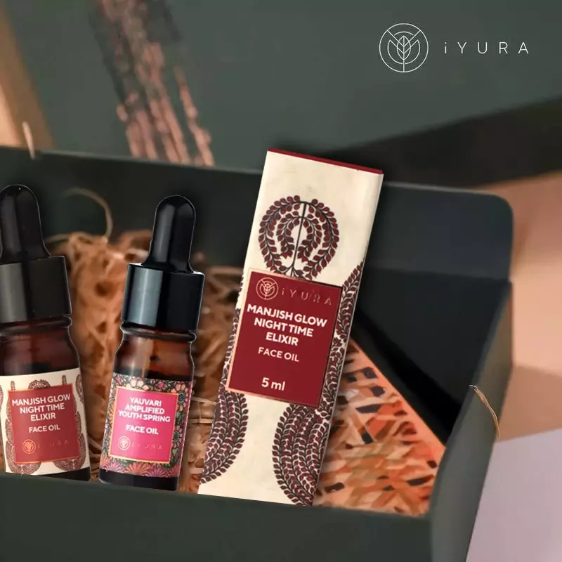 Manjish Glow Elixir and other iYURA products showing off their beautiful packaging with Madhubani painting