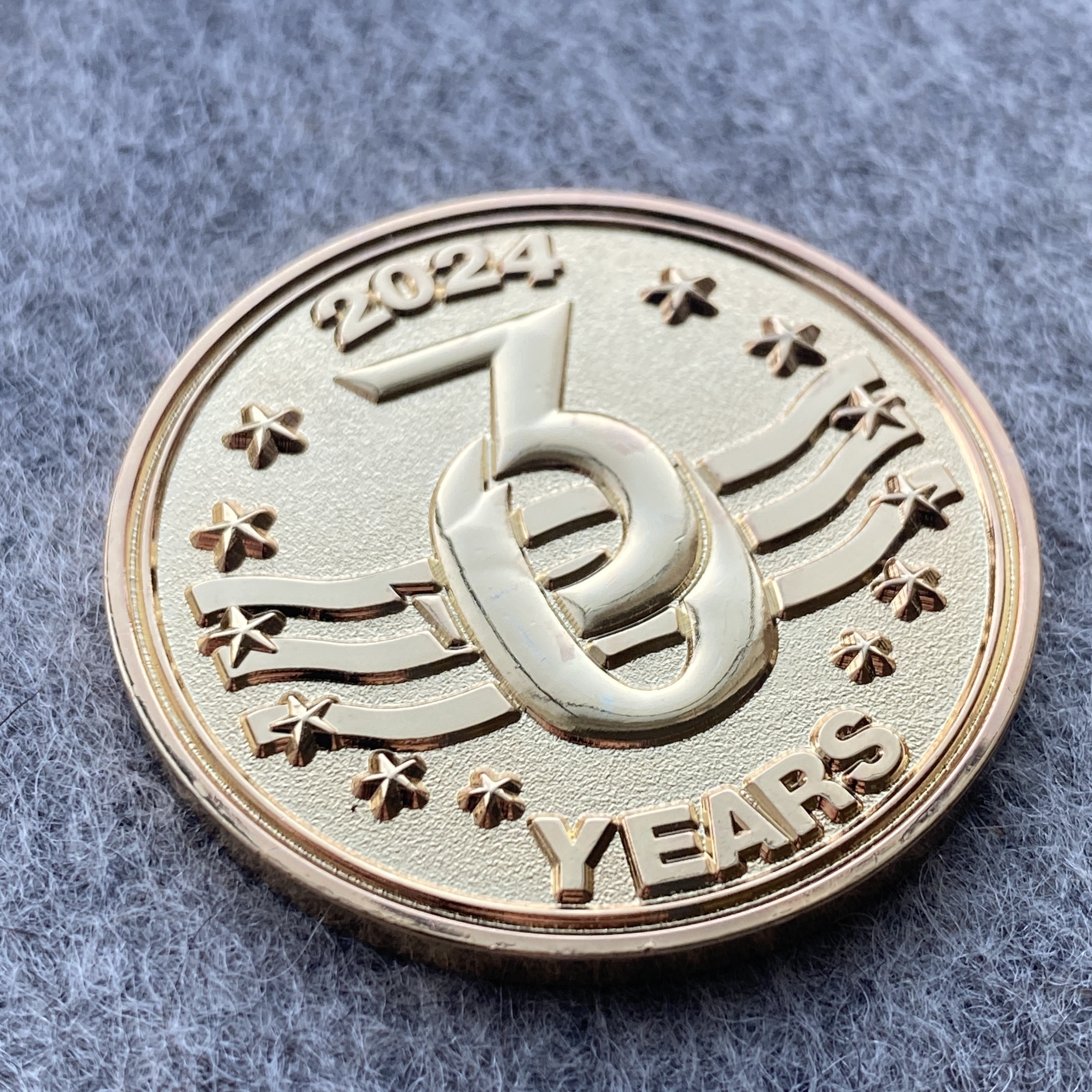 golden coin marking 30 years anniversary in 2024