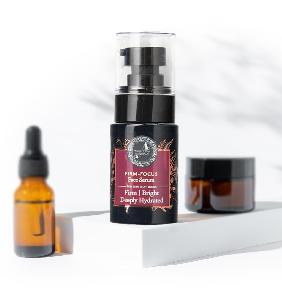 a comparative image of Firm-Focus Face Serum and blurry image of other brands' products in the background