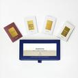 Quartana Complete Discovery Set shown with its blue slide box and several white sample cards arranged on a clean white background.