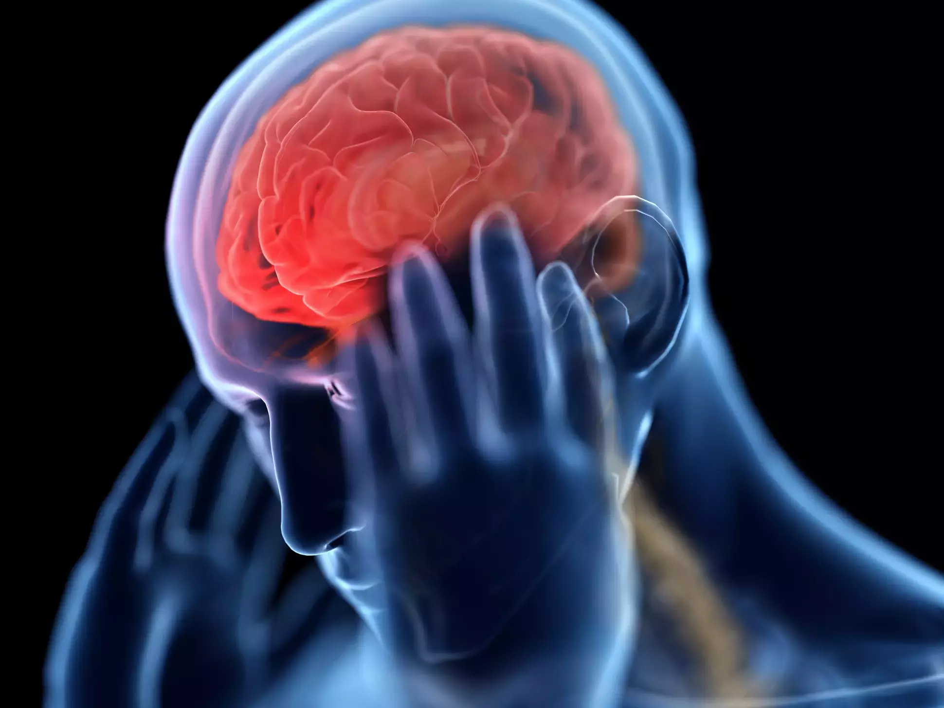 Person holding their head, brain highlighted in red to show stress.