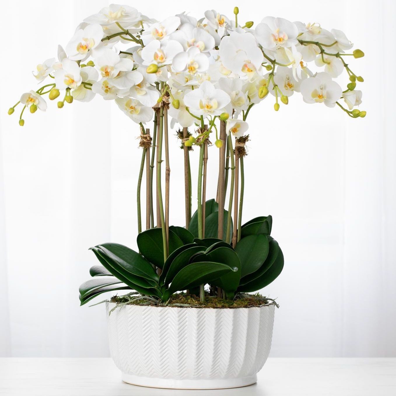 artificial orchid centerpiece arrangement