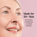 Smiling woman with fine lines and natural skin texture, alongside text stating the gel crème is made for 50+ skin with no dryness, tightness, or added silicones