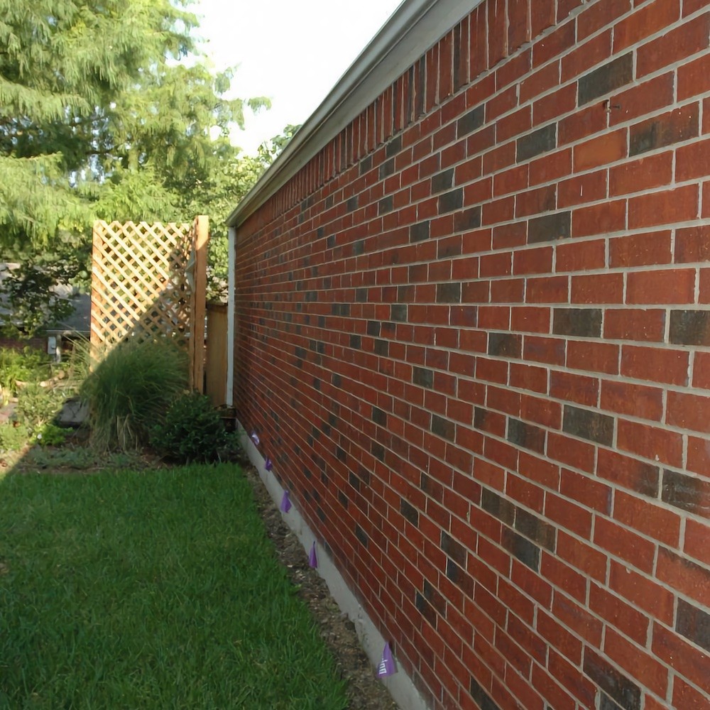 brick fence suitable for clothesline installation
