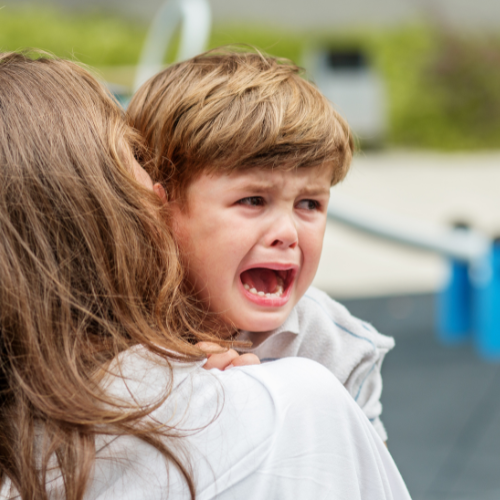 Child crying with mother