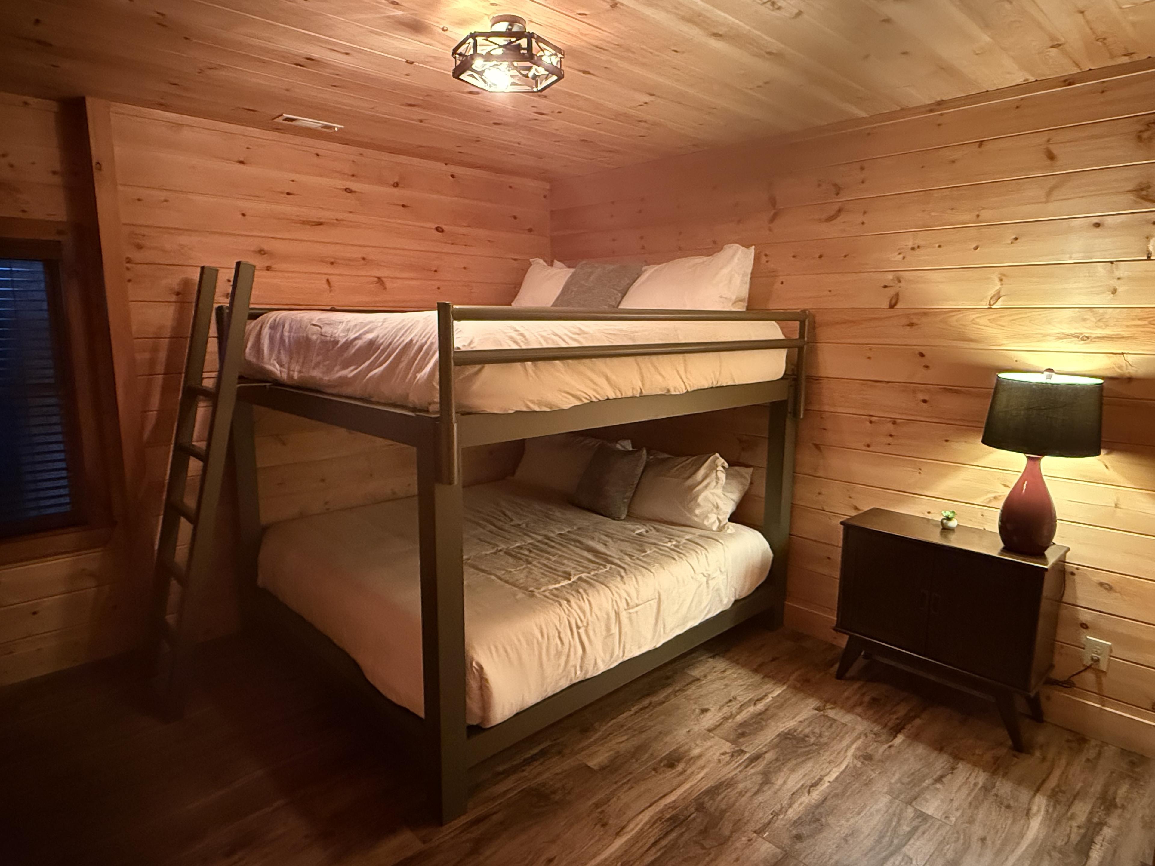 Also in the basement game room area is a third bedroom with a rare king-over-king bunk bed.