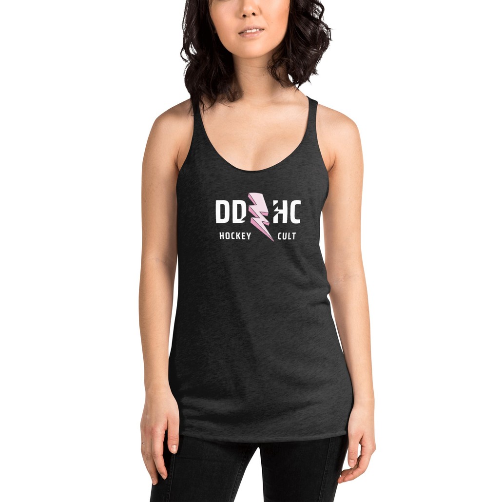 A woman with a black tank top on a white background. DDHC Hockey Cult with a pink lightning bolt
