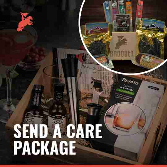 a gift crate with various gifts for men