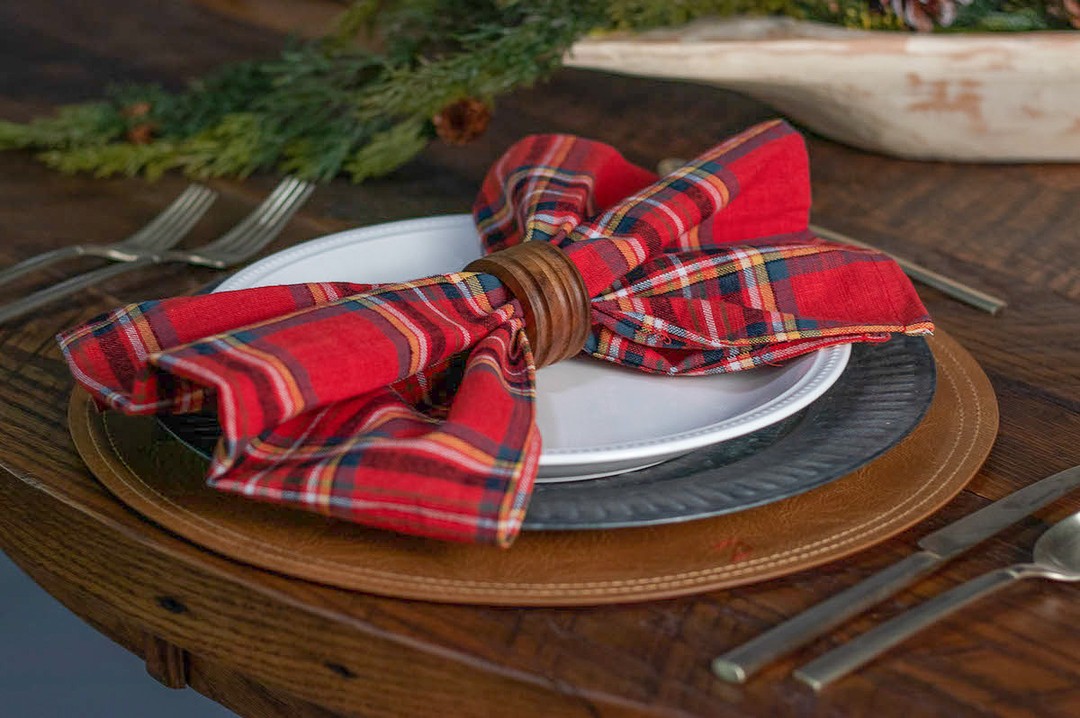 red plaid napkin white plate gray charger