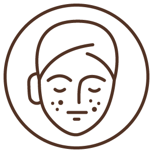 A face with visible spots symbolizing skin impurities.