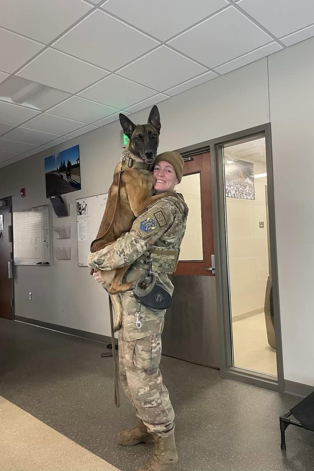 mwd rudy hugging his handler