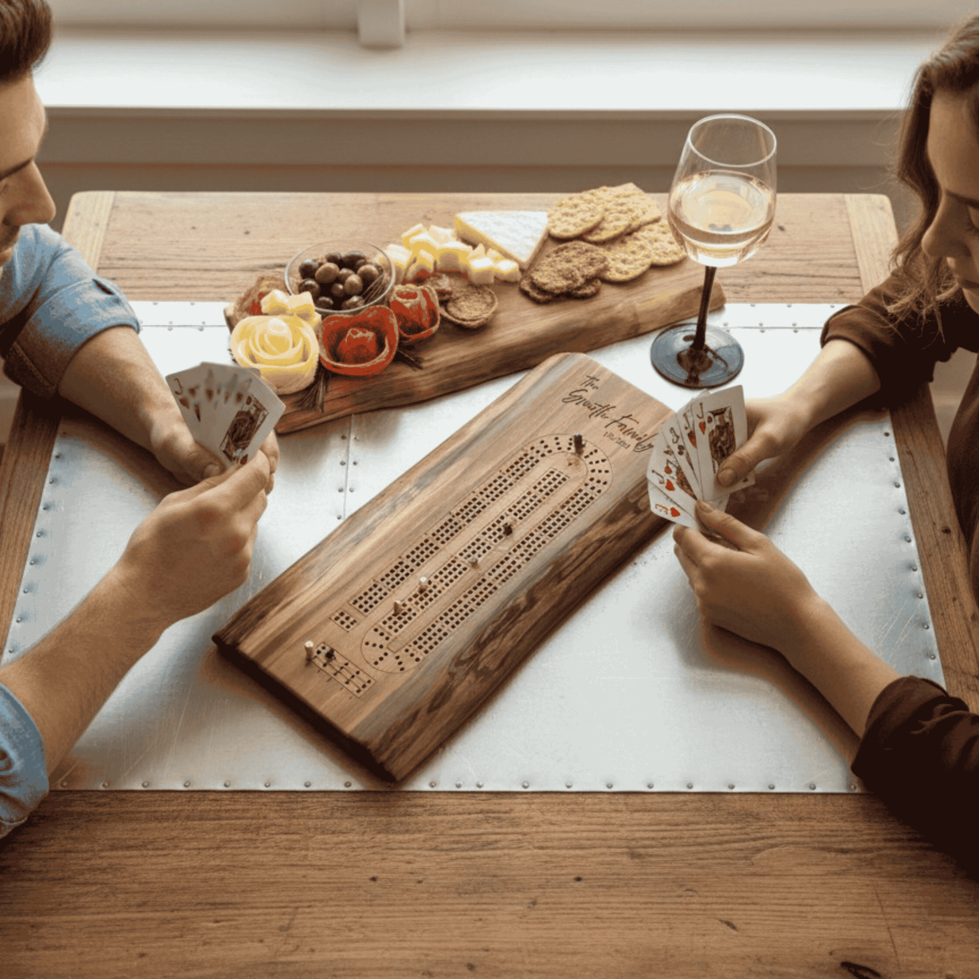 Personalized live edge cribbage board in use during a game night with friends, handcrafted wood cribbage board with custom engraving